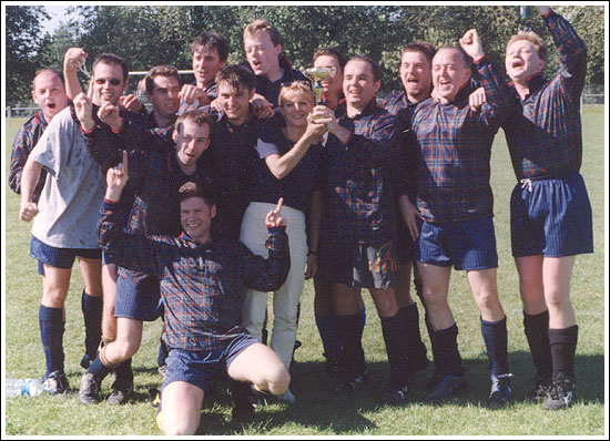 Scotland hold the World Cup Trophy aloft.