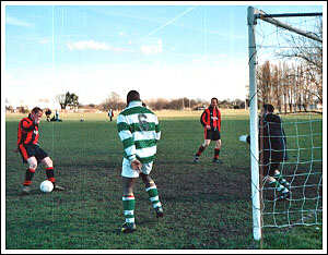 The Art of the Fanny #2: Abbott executes an elaborate, unnecessary and completely noncey dummy to take keeper and defender out of the game, leaving himself a gaping goal into which he can roll the ball at his leisure.